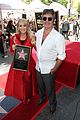 carrie underwood gets support from hubby mike fisher son isaiah at walk of fame 02