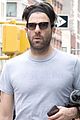 zachary quinto miles mcmillan take their dog for a walk in nyc 02