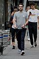 zachary quinto miles mcmillan take their dog for a walk in nyc 03