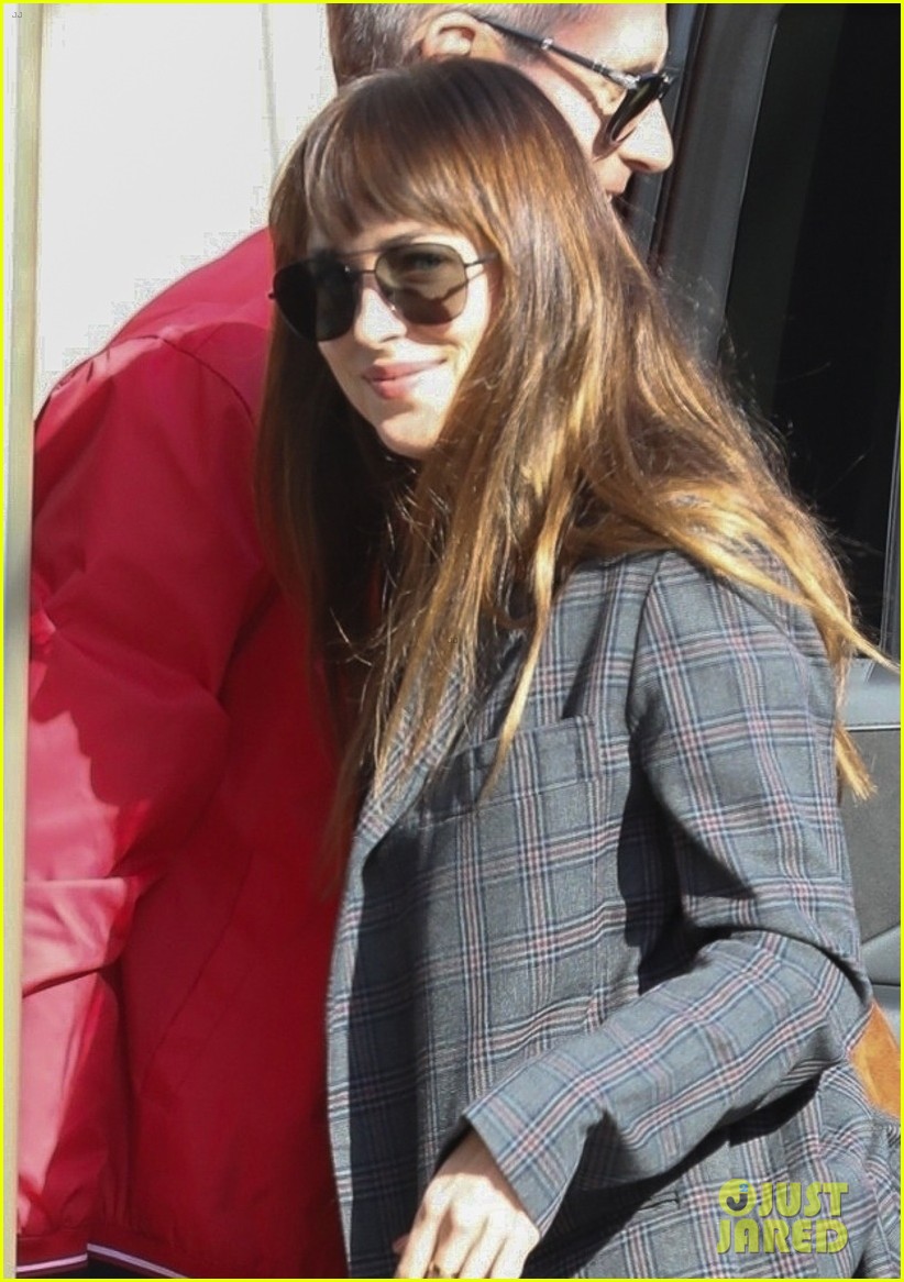 dakota johnson says filming fifty shades love scenes became tedious 044163218