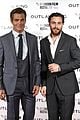 chris pine aaron taylor johnson suit up for outlaw king european premiere 02
