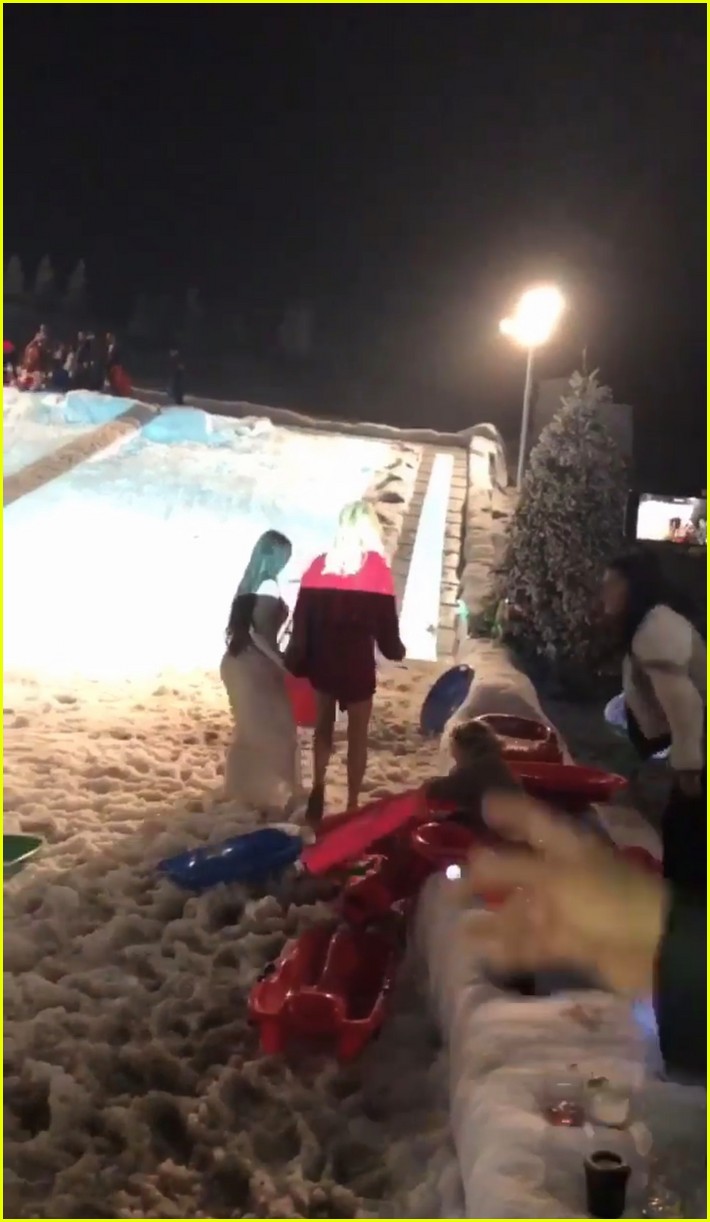 Kim Kardashian Goes Sledding in Her Gown with Paris Hilton at Christmas