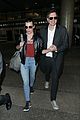 milla jovovich at airport with husband 05