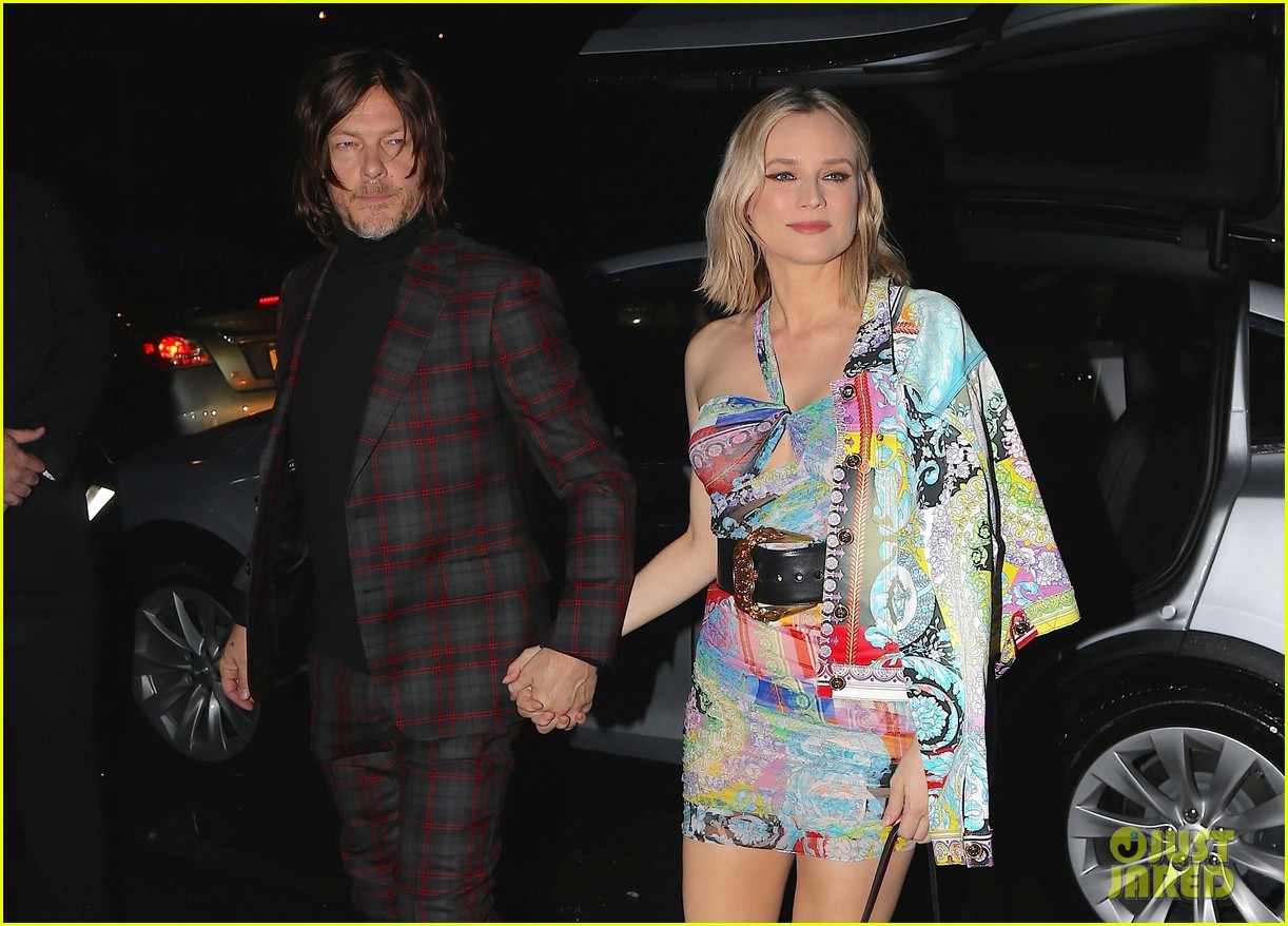 Diane Kruger & Boyfriend Norman Reedus Couple Up at Versace PreFall
