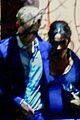 meghan markle shows off growing baby bump at christmas carol service with prince harry 02