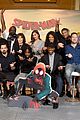 hailee steinfeld dons plunging grey pantsuit for spider man spider verse photo call 12