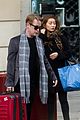 macaulay culkin hits airport with girlfriend brenda song after legally changing his name 02