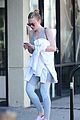 dakota fanning works out in la as sister elle steps out in nyc 01