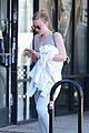 dakota fanning works out in la as sister elle steps out in nyc 07