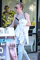 dakota fanning works out in la as sister elle steps out in nyc 12