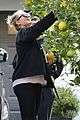 kate upton picks lemons in her yard 01