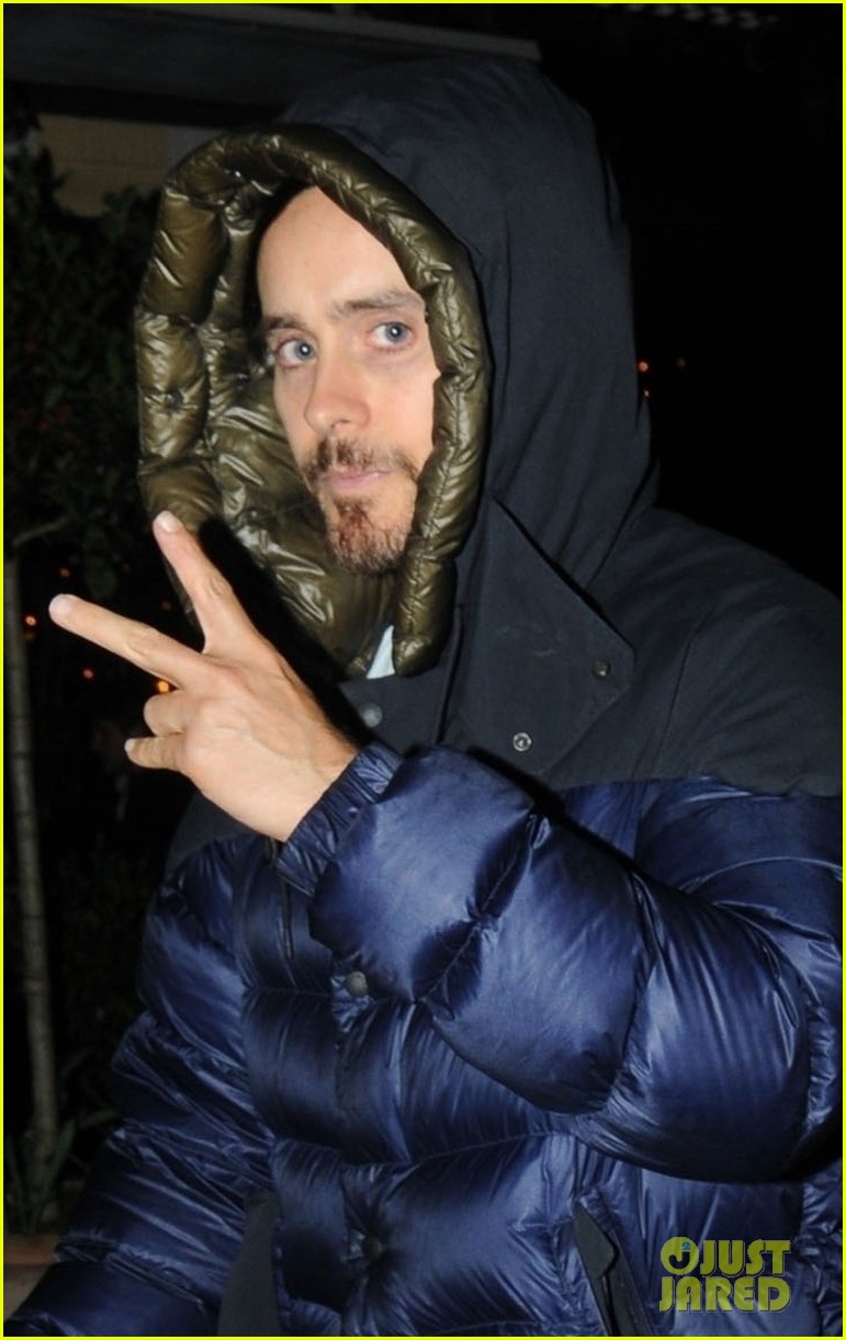 jared leto tosses up the peace sign while out london 02