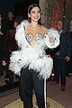 dua lipa rocks feathered frock for brit awards after party 03