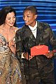 pharrell williams takes the stage in camo print at oscars 2019 06