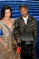 pharrell williams takes the stage in camo print at oscars 2019 10