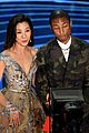 pharrell williams takes the stage in camo print at oscars 2019 17