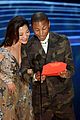 pharrell williams takes the stage in camo print at oscars 2019 19