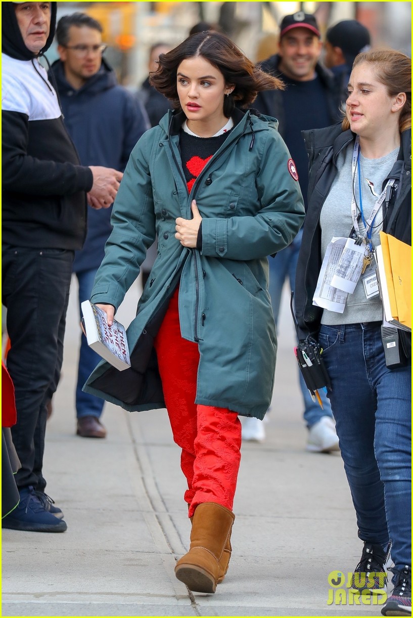 lucy hale braves the rain for day on katy keene set 07