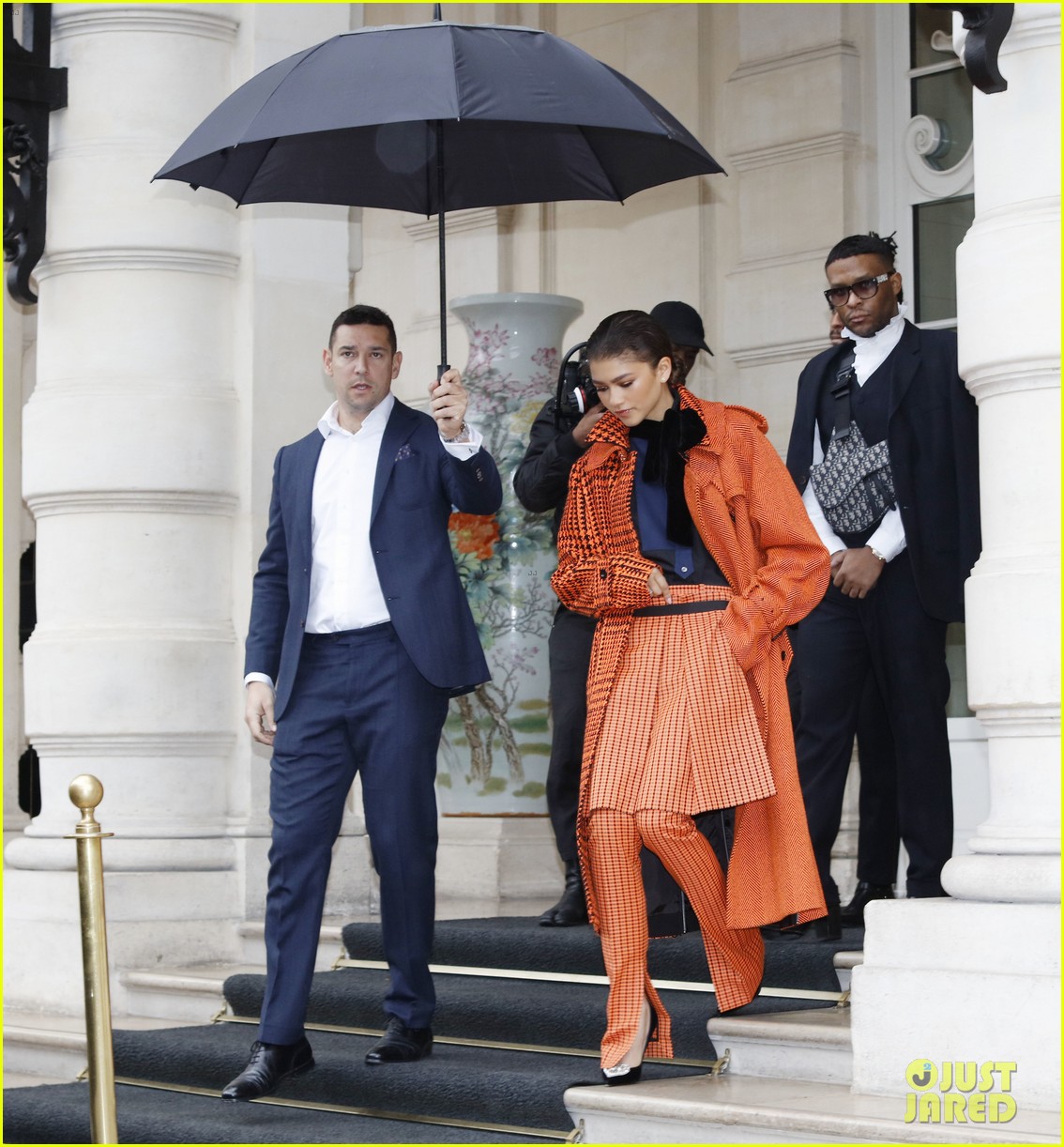 zendaya pops in orange while out during paris fashion week 044250264