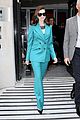 anne hathaway puts fun spin on traditional suit look 04