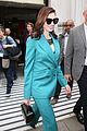 anne hathaway puts fun spin on traditional suit look 06