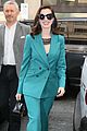 anne hathaway puts fun spin on traditional suit look 12