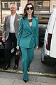 anne hathaway puts fun spin on traditional suit look 13