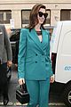 anne hathaway puts fun spin on traditional suit look 16