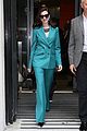 anne hathaway puts fun spin on traditional suit look 19