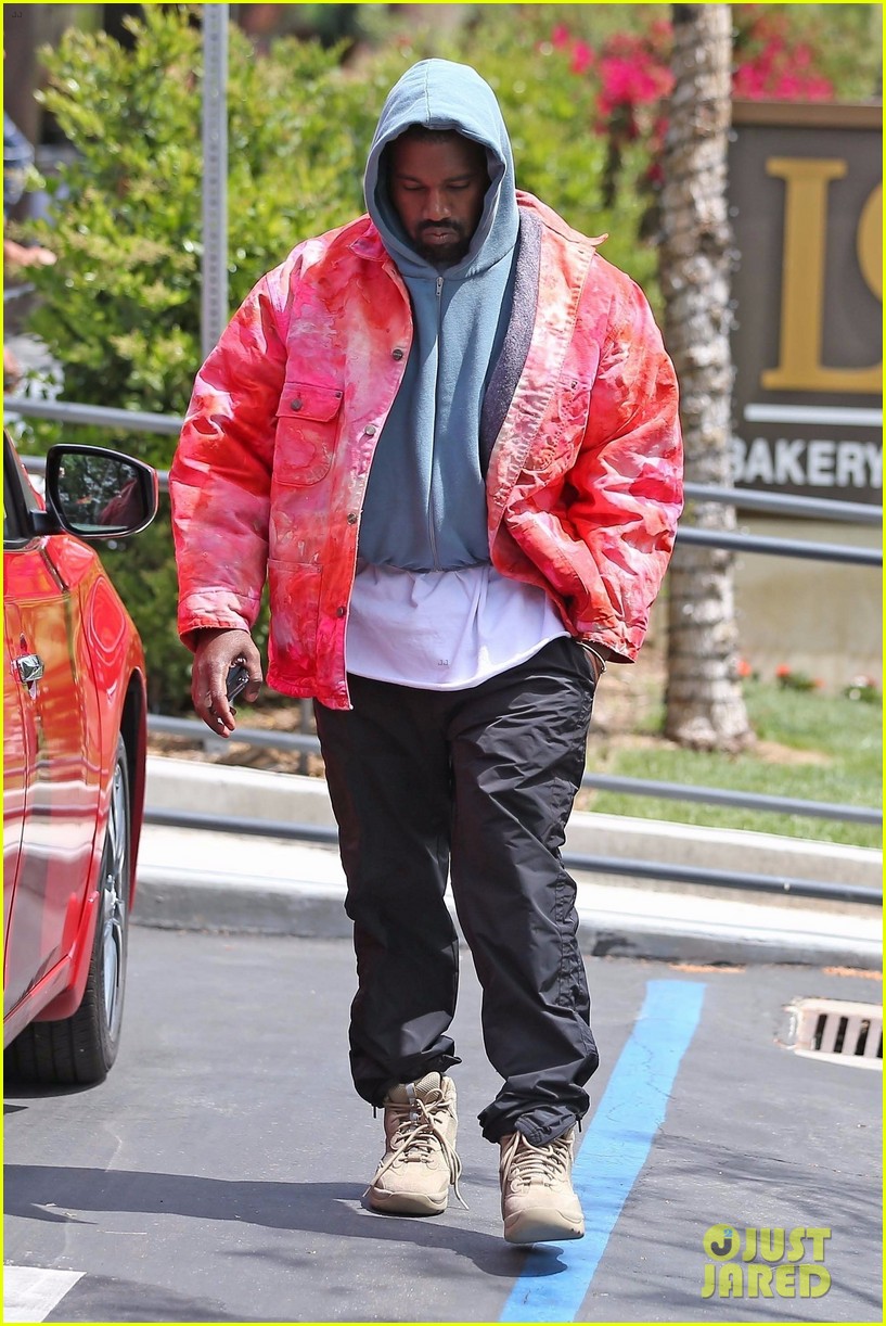 kanye west rocks tie dye while leaving the office 02