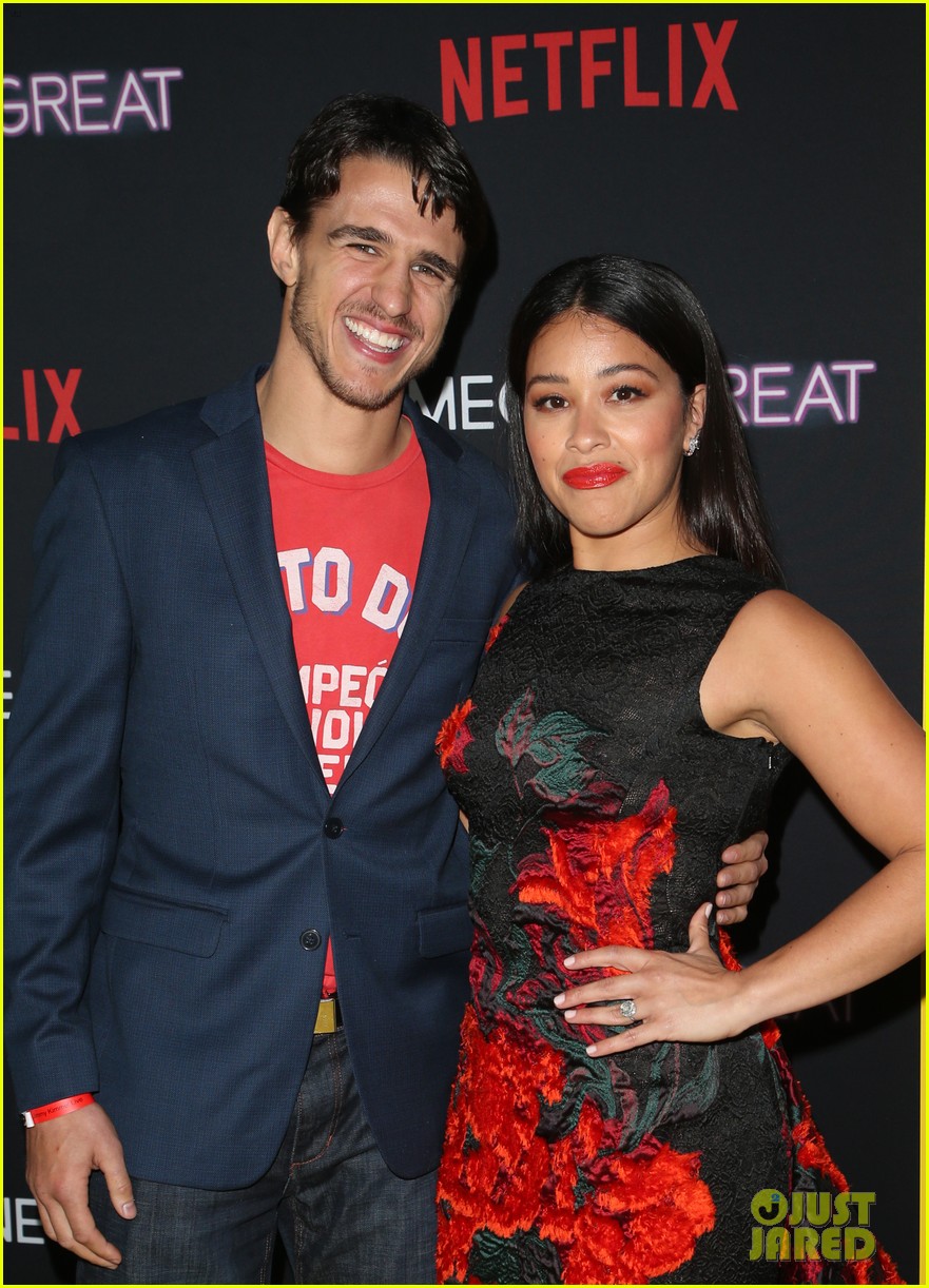 gina rodriguez is supported by fiance joe locicero at someone great premiere 014274702