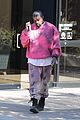 kanye west rocks bright pink outfit for day at the office 03