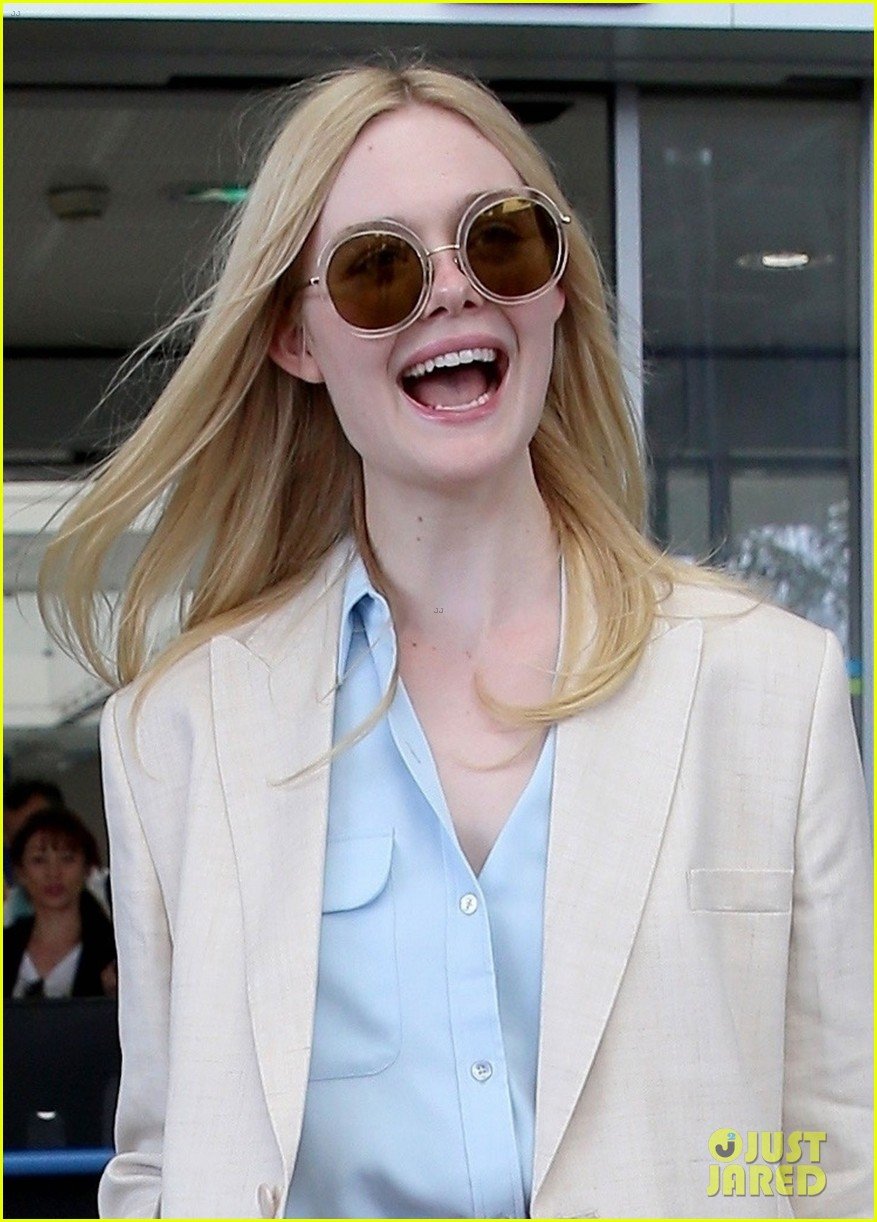 elle fanning makes chic arrival ahead of cannes film festival 044289778