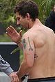 Shia LaBeouf Bares Ripped, Tattooed Torso Going Shirtless in His