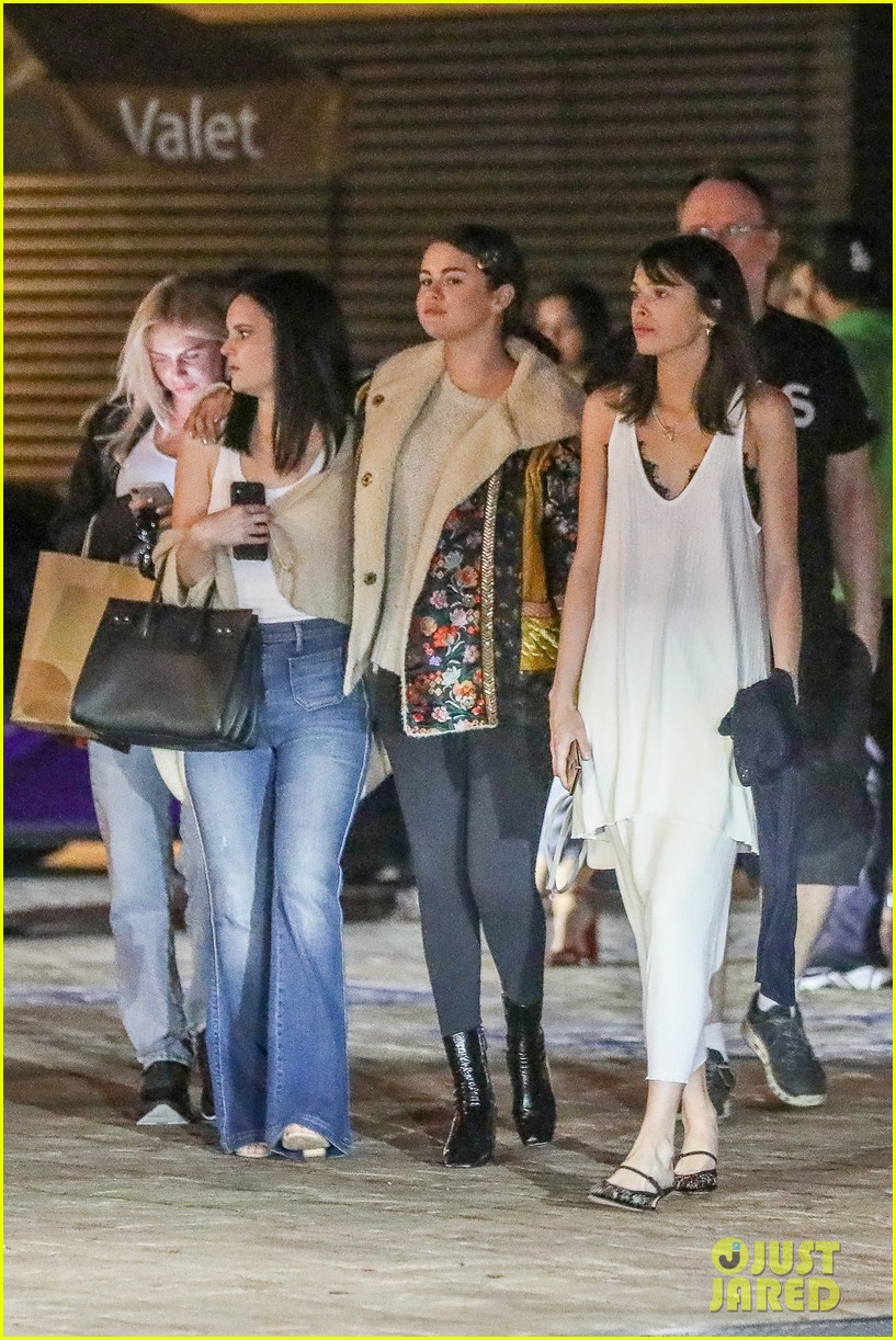 selena gomez keeps close to friends during girls night 01