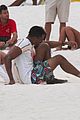 jamie dornan wrestling on the beach 06