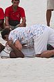 jamie dornan wrestling on the beach 07