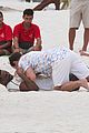 jamie dornan wrestling on the beach 08