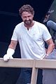 gerard butler wears a cast while filming greenland 03