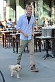 graham rogers takes dog for a walk 01