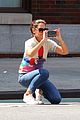 katie holmes plays photographer while out in nyc 01