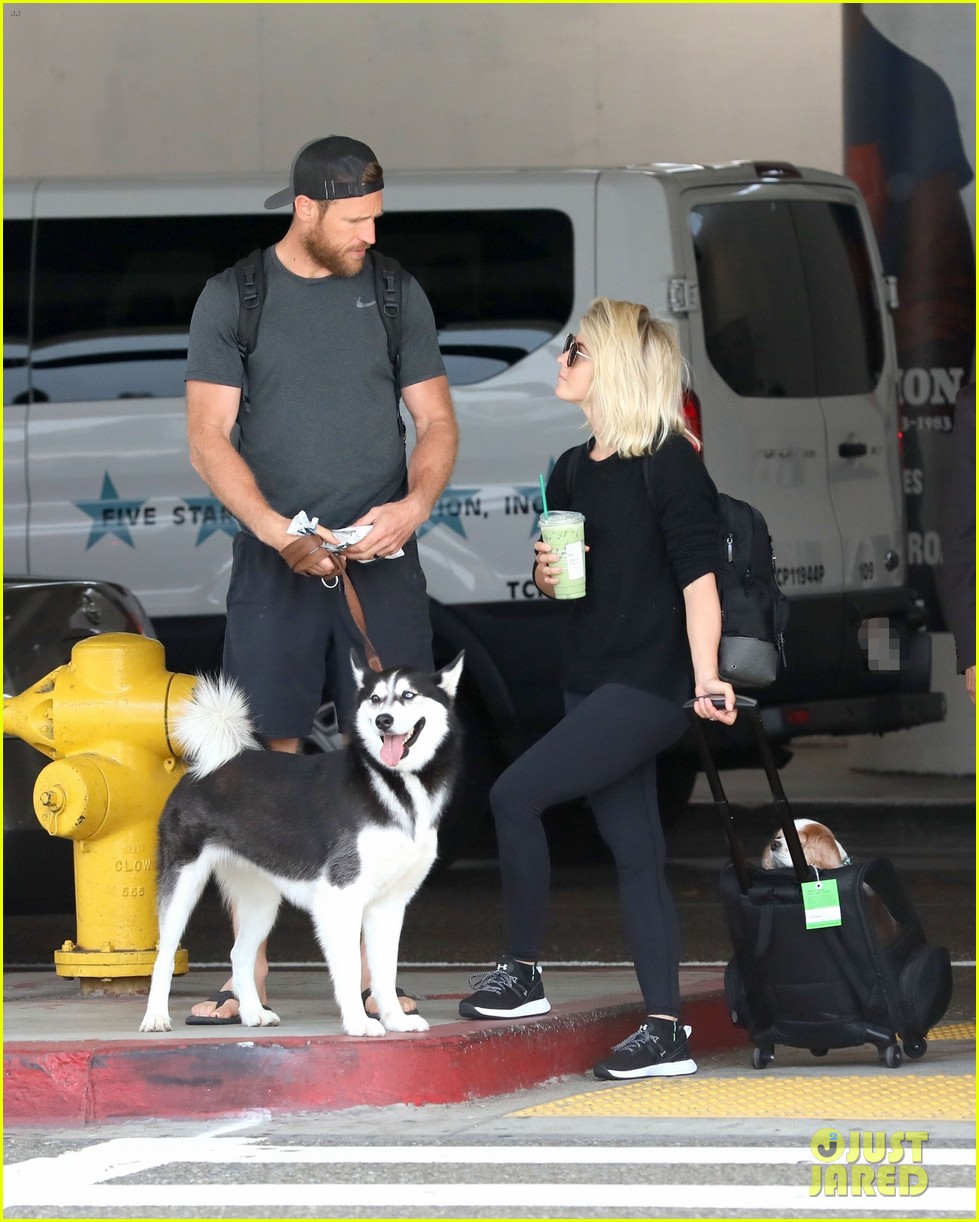 Julianne Hough & Husband Brooks Laich Arrive at LAX With Their Dogs