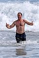 hugh jackman celebrates shirtless in the ocean 03