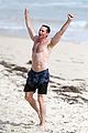 hugh jackman celebrates shirtless in the ocean 04