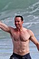 hugh jackman celebrates shirtless in the ocean 06