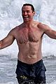 hugh jackman celebrates shirtless in the ocean 09