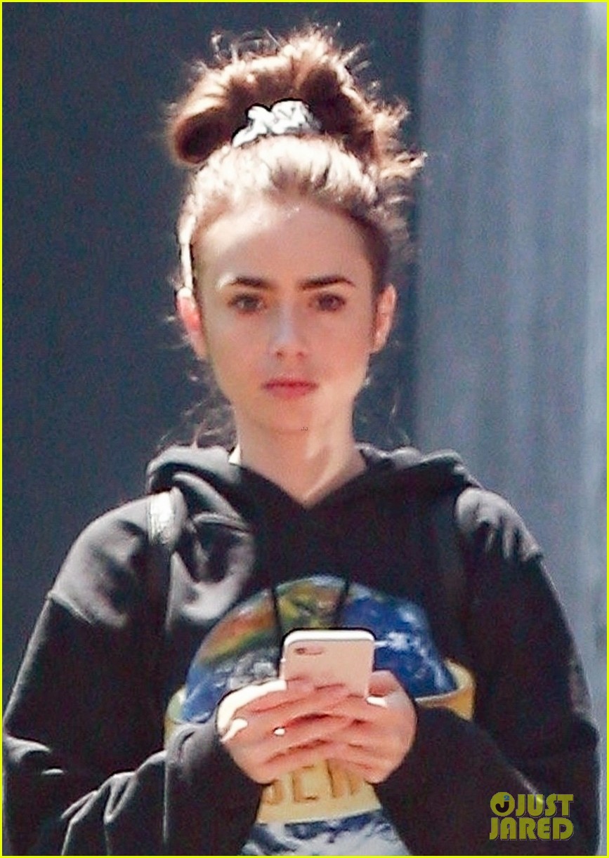 lily collins finds her own lancome ad in paris 034330604