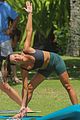 lea michele does yoga while filming her christmas movie 04