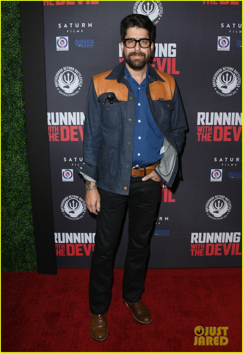 nicolas cage gets support son weston at running with the devil premiere 03