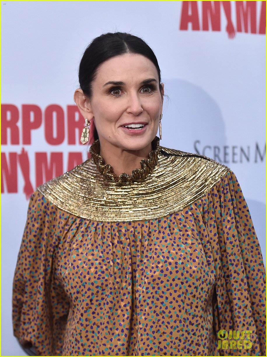 demi moore is all smiles at corporate animals premiere 144355171